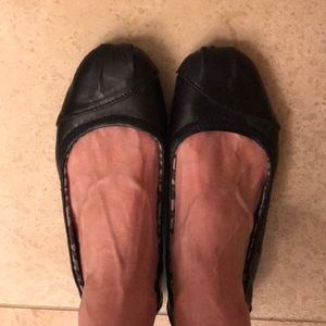 TOMS Camila black leather flats, gently used.